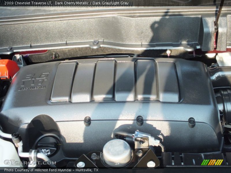 Dark Cherry Metallic / Dark Gray/Light Gray 2009 Chevrolet Traverse LT
