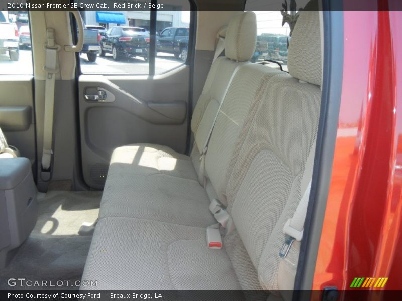 Red Brick / Beige 2010 Nissan Frontier SE Crew Cab