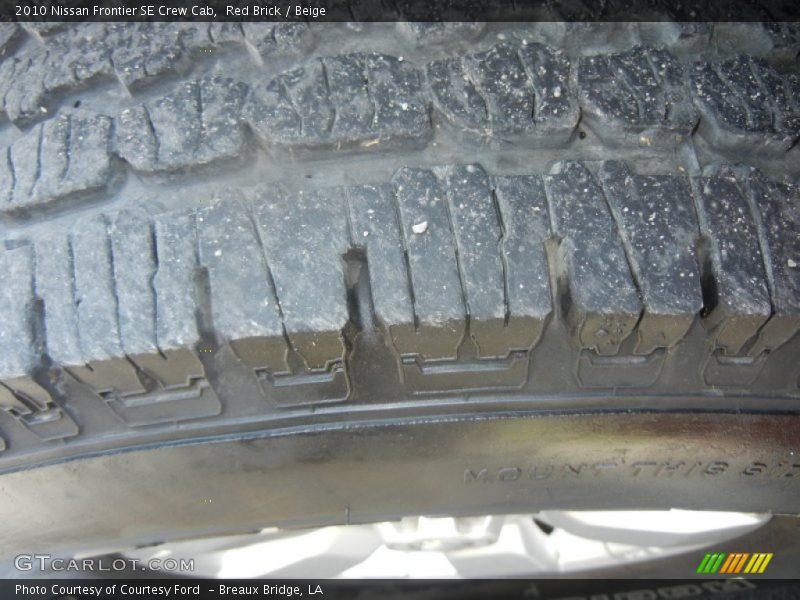 Red Brick / Beige 2010 Nissan Frontier SE Crew Cab