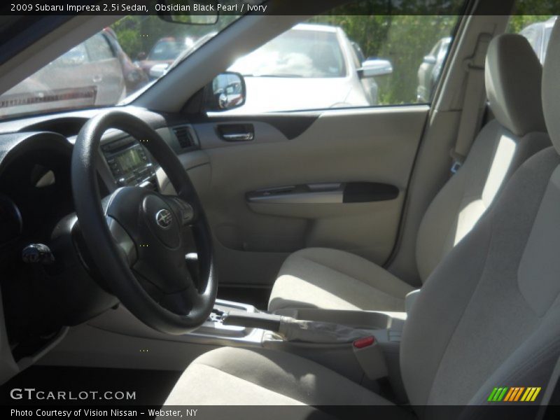 Obsidian Black Pearl / Ivory 2009 Subaru Impreza 2.5i Sedan