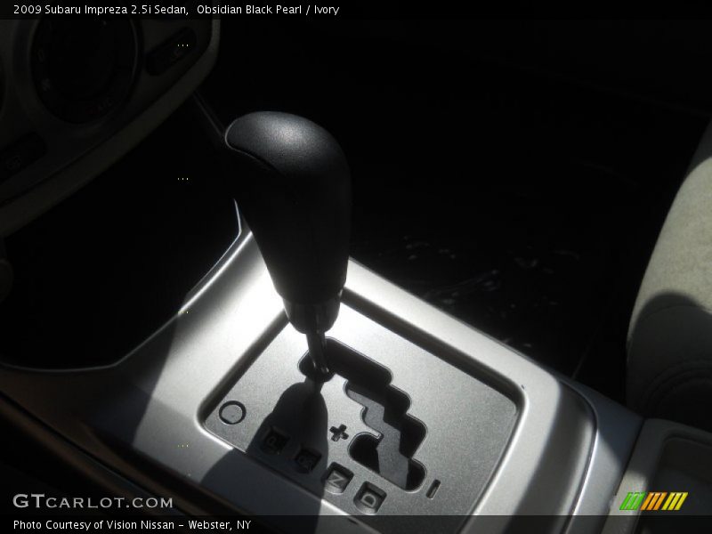 Obsidian Black Pearl / Ivory 2009 Subaru Impreza 2.5i Sedan