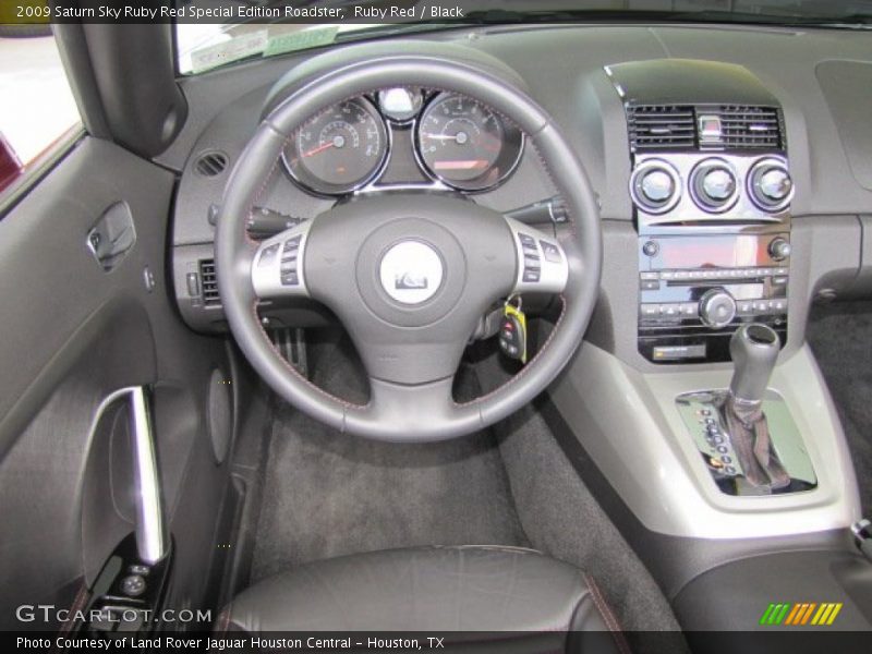 Dashboard of 2009 Sky Ruby Red Special Edition Roadster