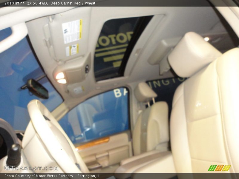 Deep Garnet Red / Wheat 2010 Infiniti QX 56 4WD