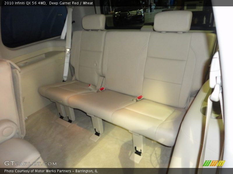 Deep Garnet Red / Wheat 2010 Infiniti QX 56 4WD