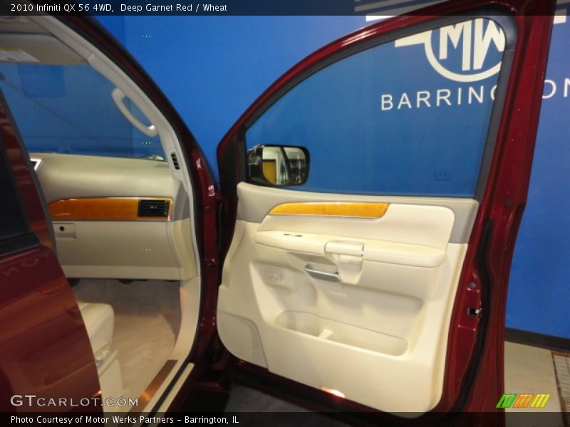 Deep Garnet Red / Wheat 2010 Infiniti QX 56 4WD