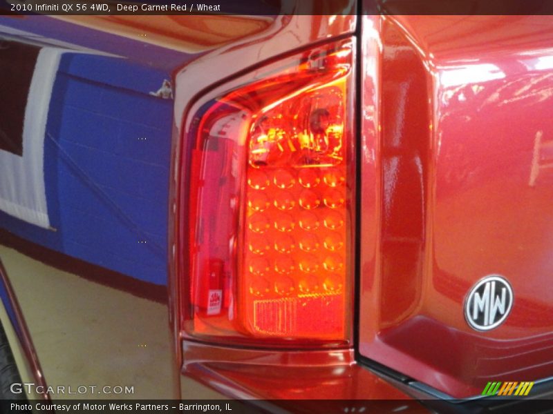 Deep Garnet Red / Wheat 2010 Infiniti QX 56 4WD