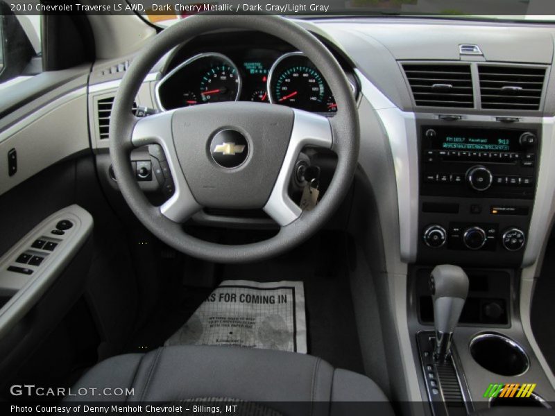 Dark Cherry Metallic / Dark Gray/Light Gray 2010 Chevrolet Traverse LS AWD