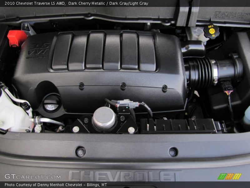 Dark Cherry Metallic / Dark Gray/Light Gray 2010 Chevrolet Traverse LS AWD