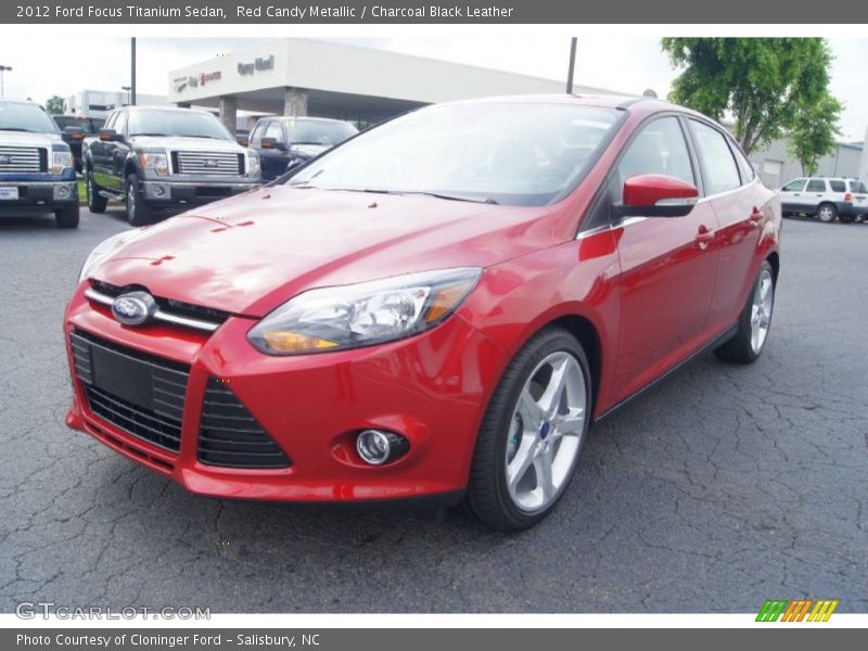 Red Candy Metallic / Charcoal Black Leather 2012 Ford Focus Titanium Sedan