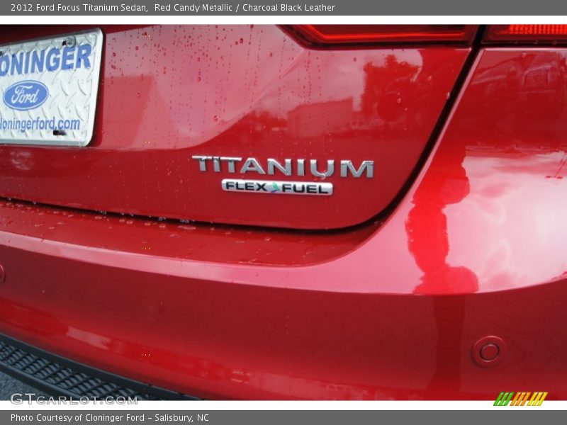 Red Candy Metallic / Charcoal Black Leather 2012 Ford Focus Titanium Sedan