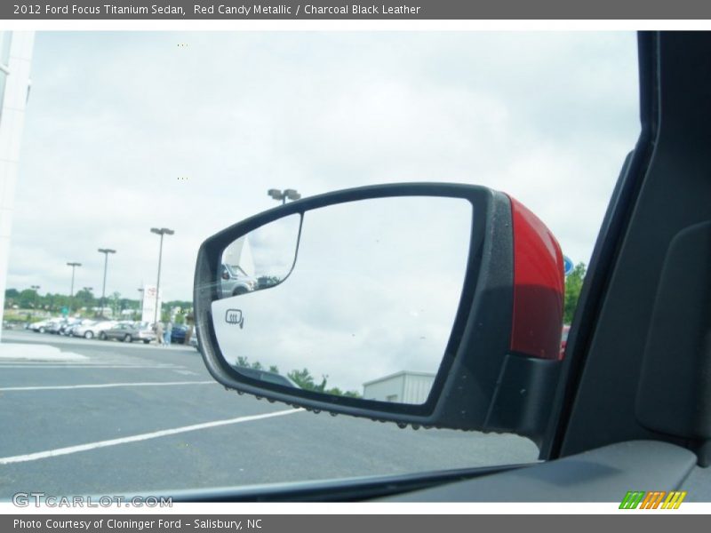Red Candy Metallic / Charcoal Black Leather 2012 Ford Focus Titanium Sedan