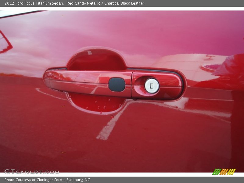 Red Candy Metallic / Charcoal Black Leather 2012 Ford Focus Titanium Sedan