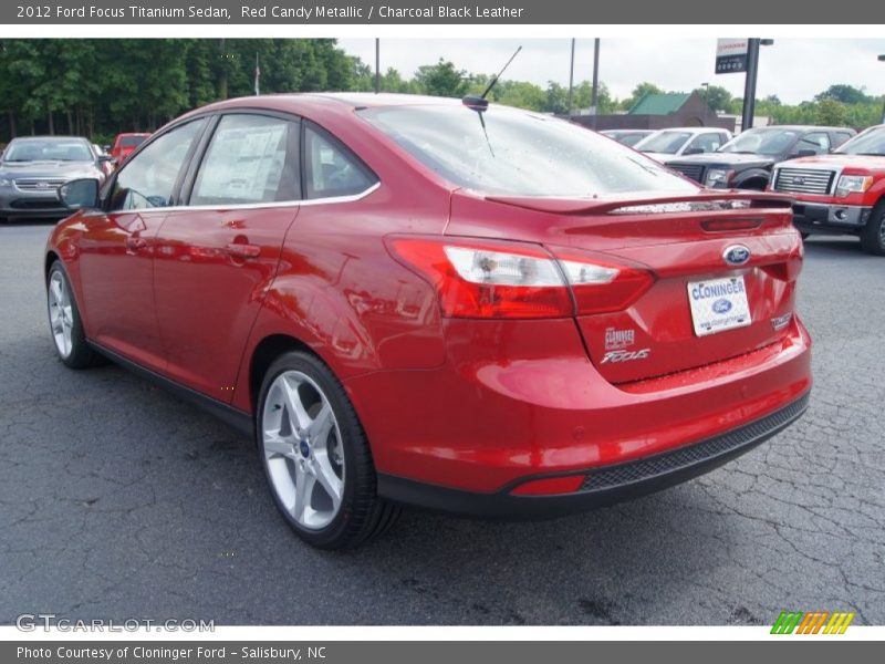 Red Candy Metallic / Charcoal Black Leather 2012 Ford Focus Titanium Sedan