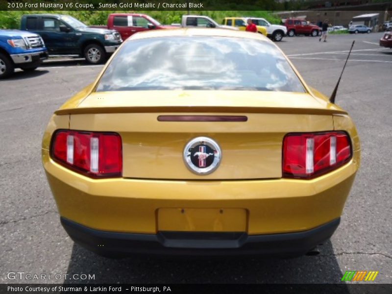 Sunset Gold Metallic / Charcoal Black 2010 Ford Mustang V6 Coupe