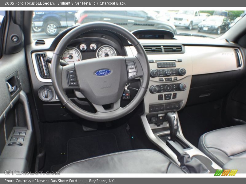 Brilliant Silver Metallic / Charcoal Black 2009 Ford Focus SEL Sedan