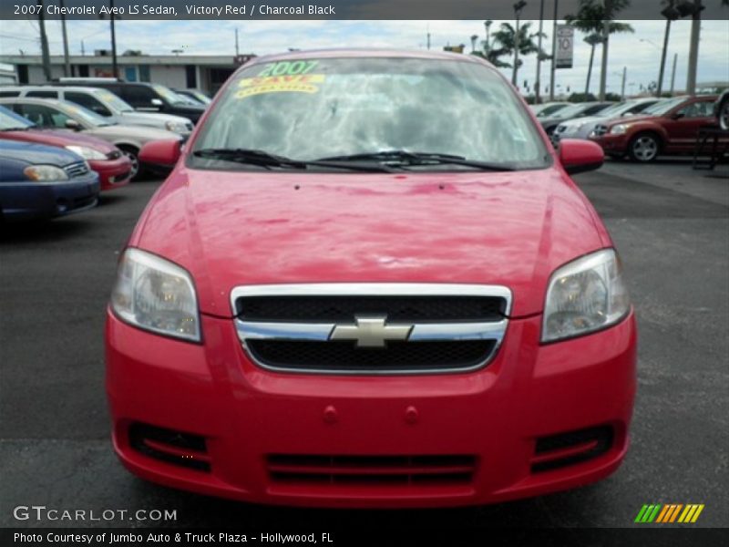 Victory Red / Charcoal Black 2007 Chevrolet Aveo LS Sedan