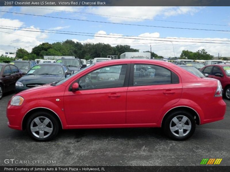 Victory Red / Charcoal Black 2007 Chevrolet Aveo LS Sedan
