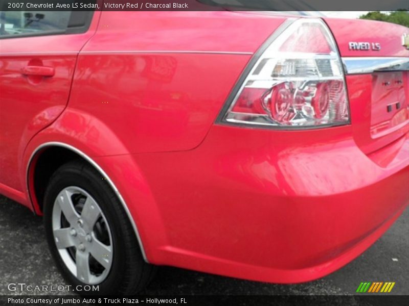 Victory Red / Charcoal Black 2007 Chevrolet Aveo LS Sedan