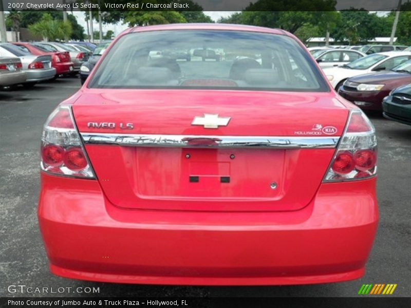 Victory Red / Charcoal Black 2007 Chevrolet Aveo LS Sedan