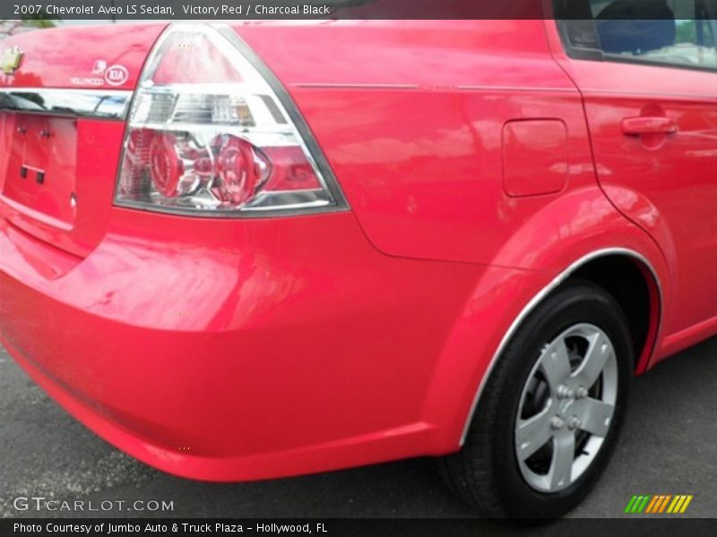 Victory Red / Charcoal Black 2007 Chevrolet Aveo LS Sedan