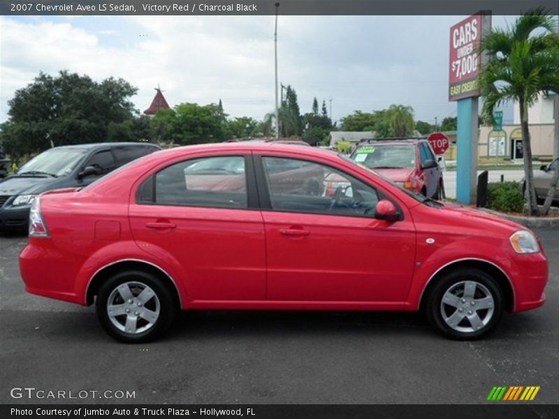 Victory Red / Charcoal Black 2007 Chevrolet Aveo LS Sedan