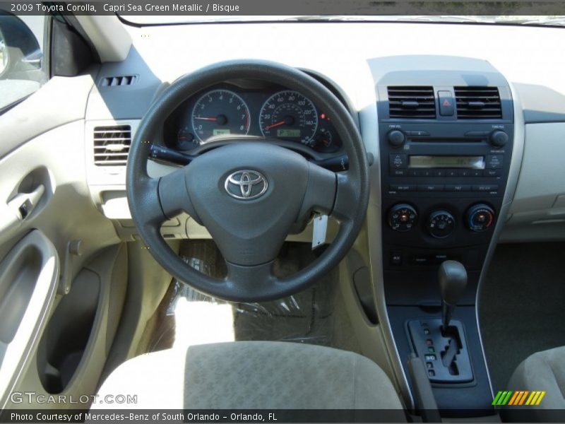 Capri Sea Green Metallic / Bisque 2009 Toyota Corolla