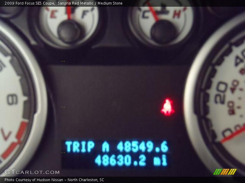 Sangria Red Metallic / Medium Stone 2009 Ford Focus SES Coupe