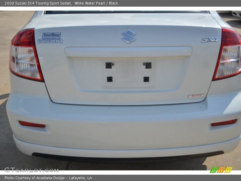 White Water Pearl / Black 2009 Suzuki SX4 Touring Sport Sedan