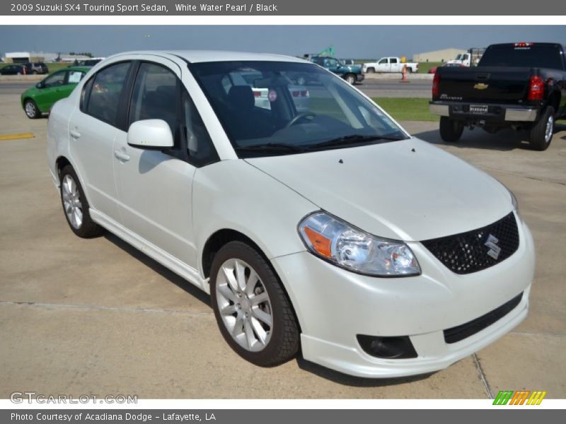 Front 3/4 View of 2009 SX4 Touring Sport Sedan