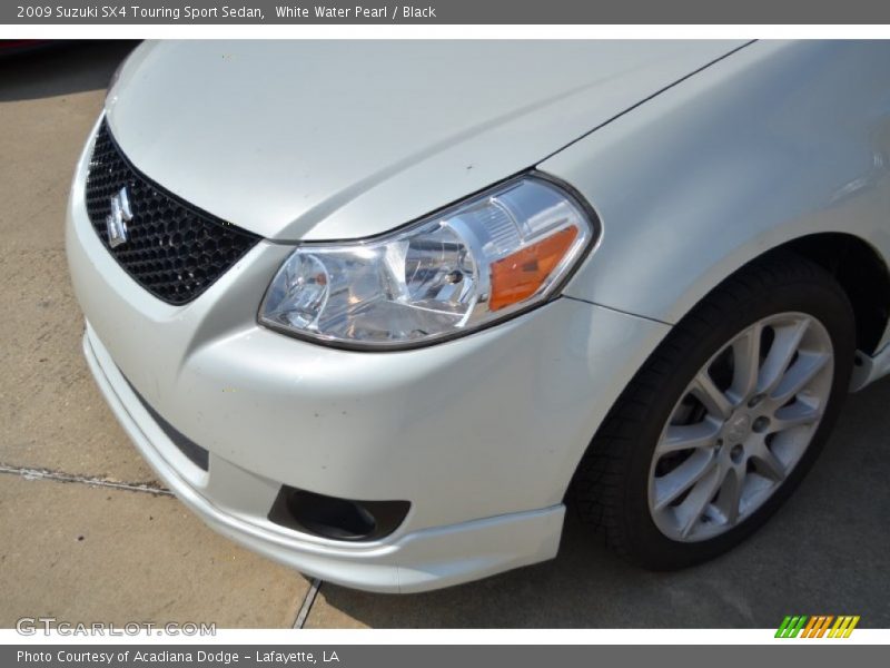White Water Pearl / Black 2009 Suzuki SX4 Touring Sport Sedan