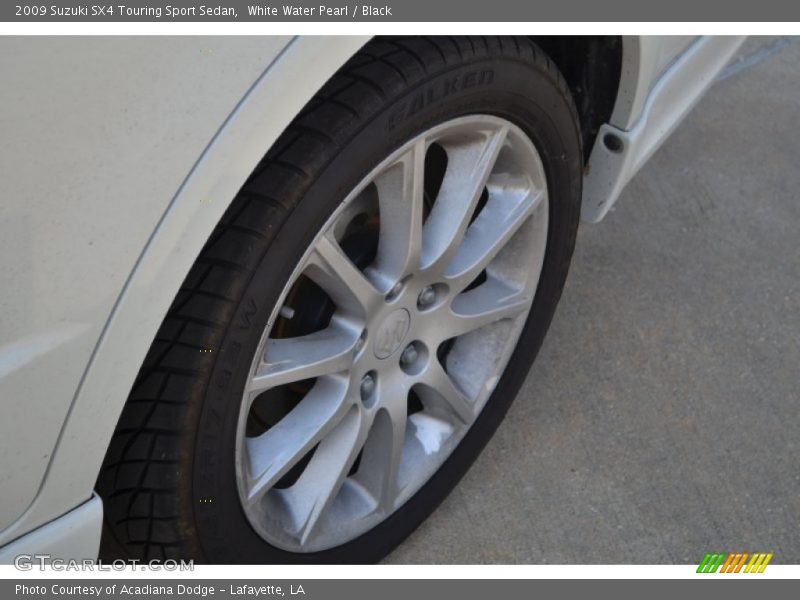 White Water Pearl / Black 2009 Suzuki SX4 Touring Sport Sedan