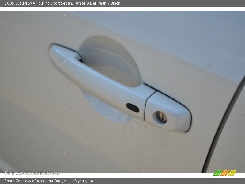 White Water Pearl / Black 2009 Suzuki SX4 Touring Sport Sedan