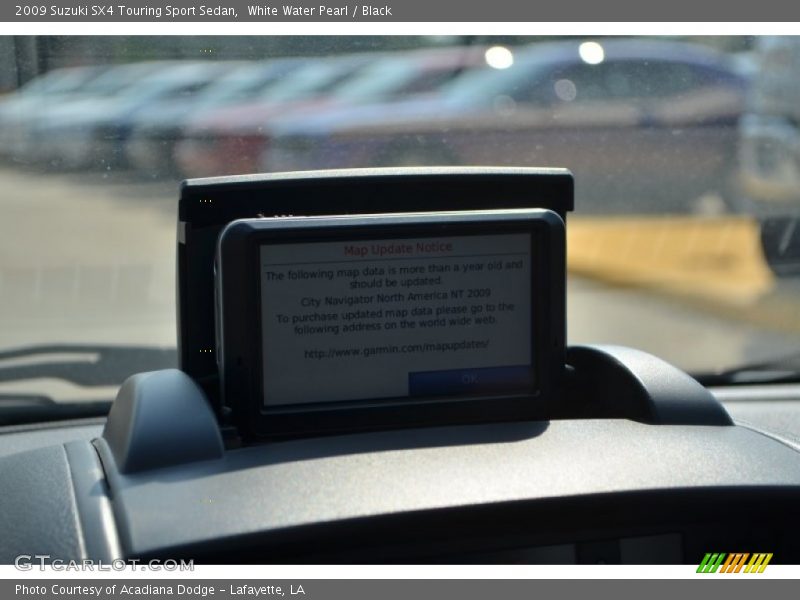 White Water Pearl / Black 2009 Suzuki SX4 Touring Sport Sedan
