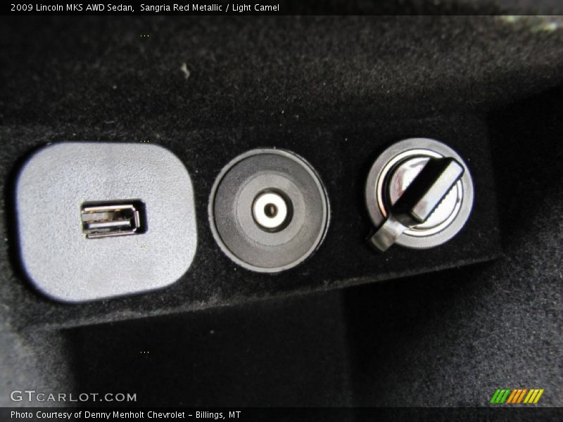 Sangria Red Metallic / Light Camel 2009 Lincoln MKS AWD Sedan