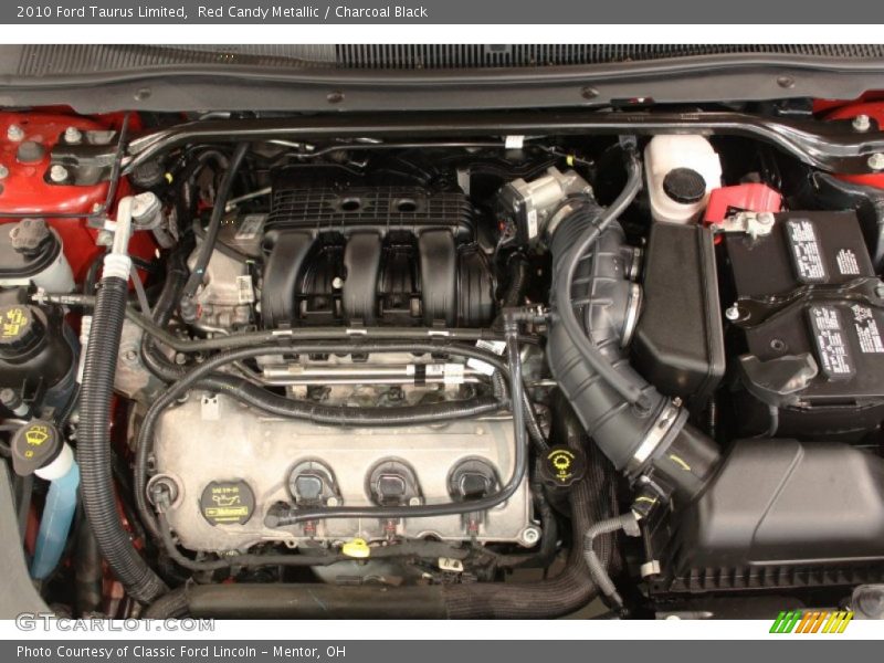 Red Candy Metallic / Charcoal Black 2010 Ford Taurus Limited