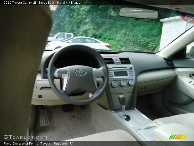 Sandy Beach Metallic / Bisque 2010 Toyota Camry LE