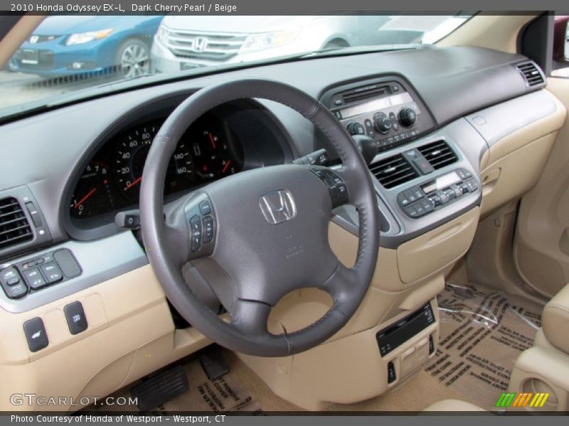 Dark Cherry Pearl / Beige 2010 Honda Odyssey EX-L