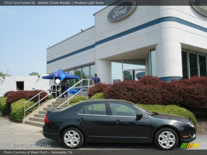 Atlantis Green Metallic / Medium Light Stone 2010 Ford Fusion SE