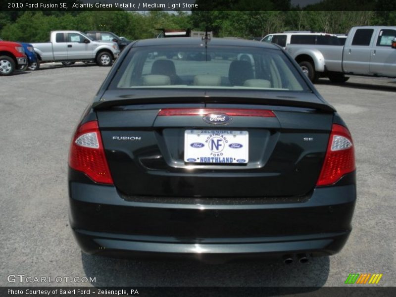 Atlantis Green Metallic / Medium Light Stone 2010 Ford Fusion SE