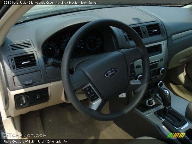 Atlantis Green Metallic / Medium Light Stone 2010 Ford Fusion SE