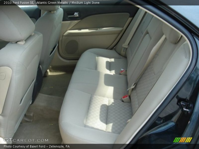 Atlantis Green Metallic / Medium Light Stone 2010 Ford Fusion SE