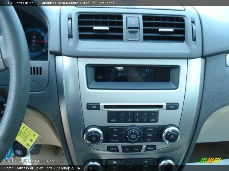 Atlantis Green Metallic / Medium Light Stone 2010 Ford Fusion SE