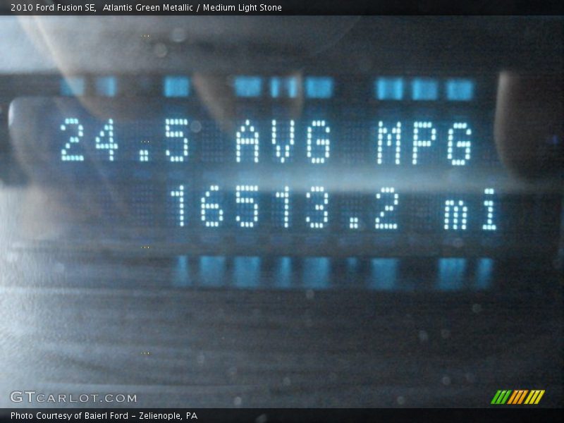 Atlantis Green Metallic / Medium Light Stone 2010 Ford Fusion SE