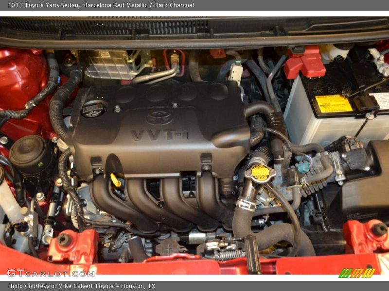 Barcelona Red Metallic / Dark Charcoal 2011 Toyota Yaris Sedan