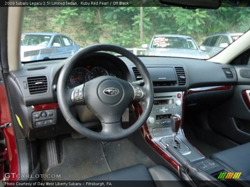 Ruby Red Pearl / Off Black 2009 Subaru Legacy 2.5i Limited Sedan