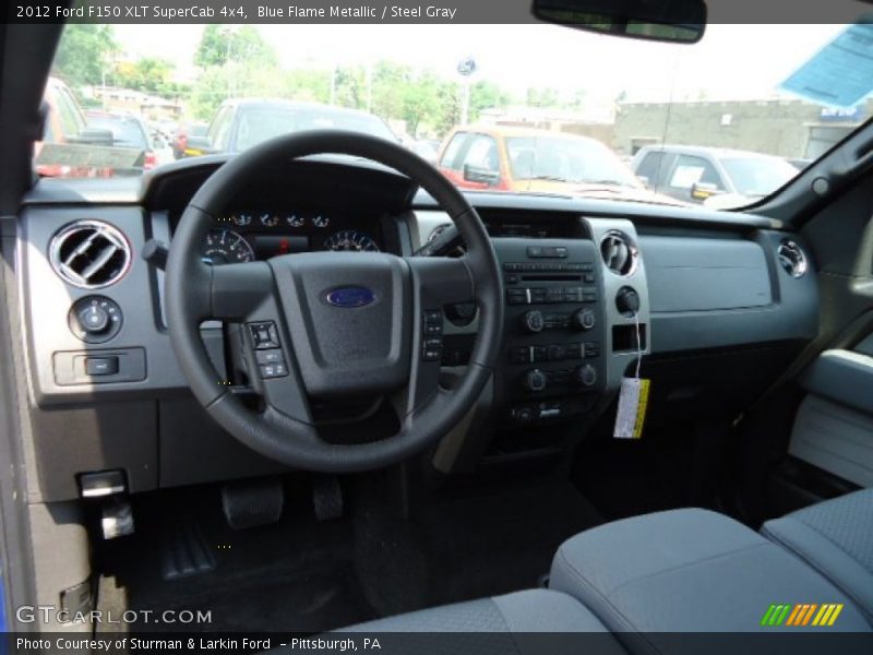 Blue Flame Metallic / Steel Gray 2012 Ford F150 XLT SuperCab 4x4