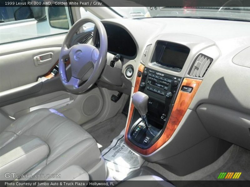 Golden White Pearl / Gray 1999 Lexus RX 300 AWD