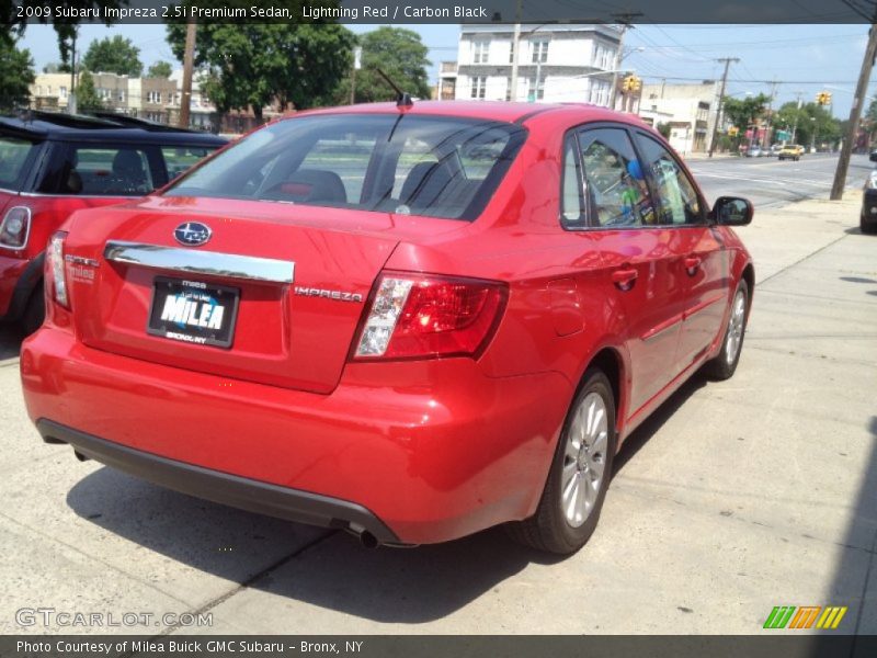 Lightning Red / Carbon Black 2009 Subaru Impreza 2.5i Premium Sedan