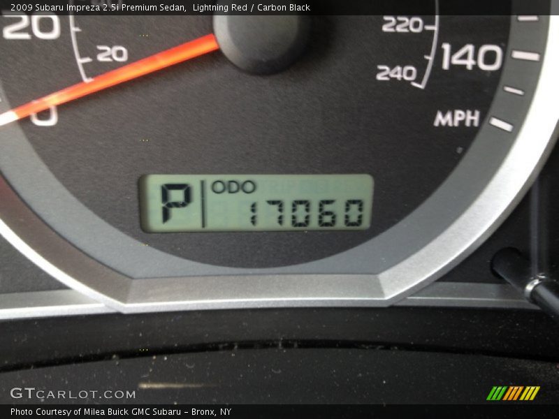 Lightning Red / Carbon Black 2009 Subaru Impreza 2.5i Premium Sedan