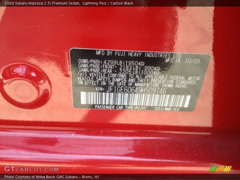 Lightning Red / Carbon Black 2009 Subaru Impreza 2.5i Premium Sedan